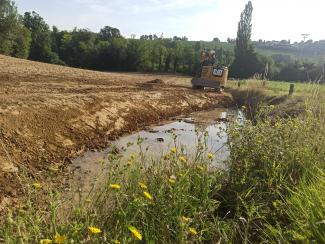 Photo de la mare restaurée à Auriac sur Vendinelle